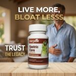 Hurrywell Gastric Care Capsules bottle placed on a table with a man holding his stomach in the background, promoting relief from gas, bloating, heartburn, and hyper acidity with the tagline “Live More, Bloat Less.”