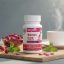 Hurrywell Women Care Capsules bottle placed on a wooden tray with rose petals, mint leaves, and a warm herbal tea setup in the background, representing women’s reproductive wellness support.